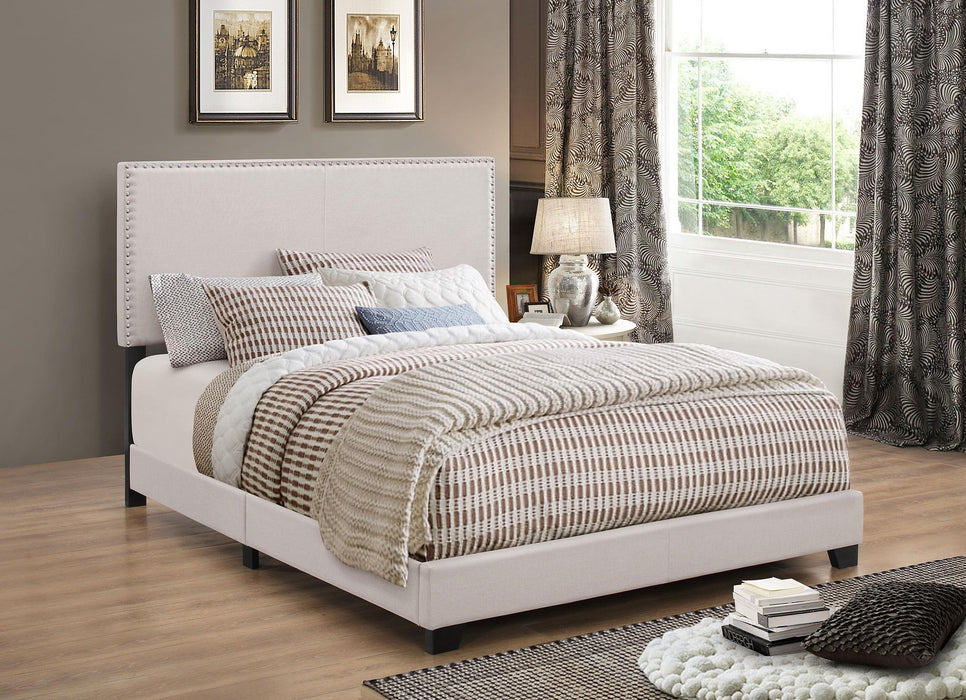 Boyd Eastern King Upholstered Bed with Nailhead Trim Ivory image