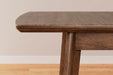 Lyncott Dining Extension Table - In Home Furniture (San Antonio, TX)