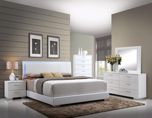 Lorimar White PU & Chrome Leg Queen Bed - In Home Furniture (San Antonio, TX)
